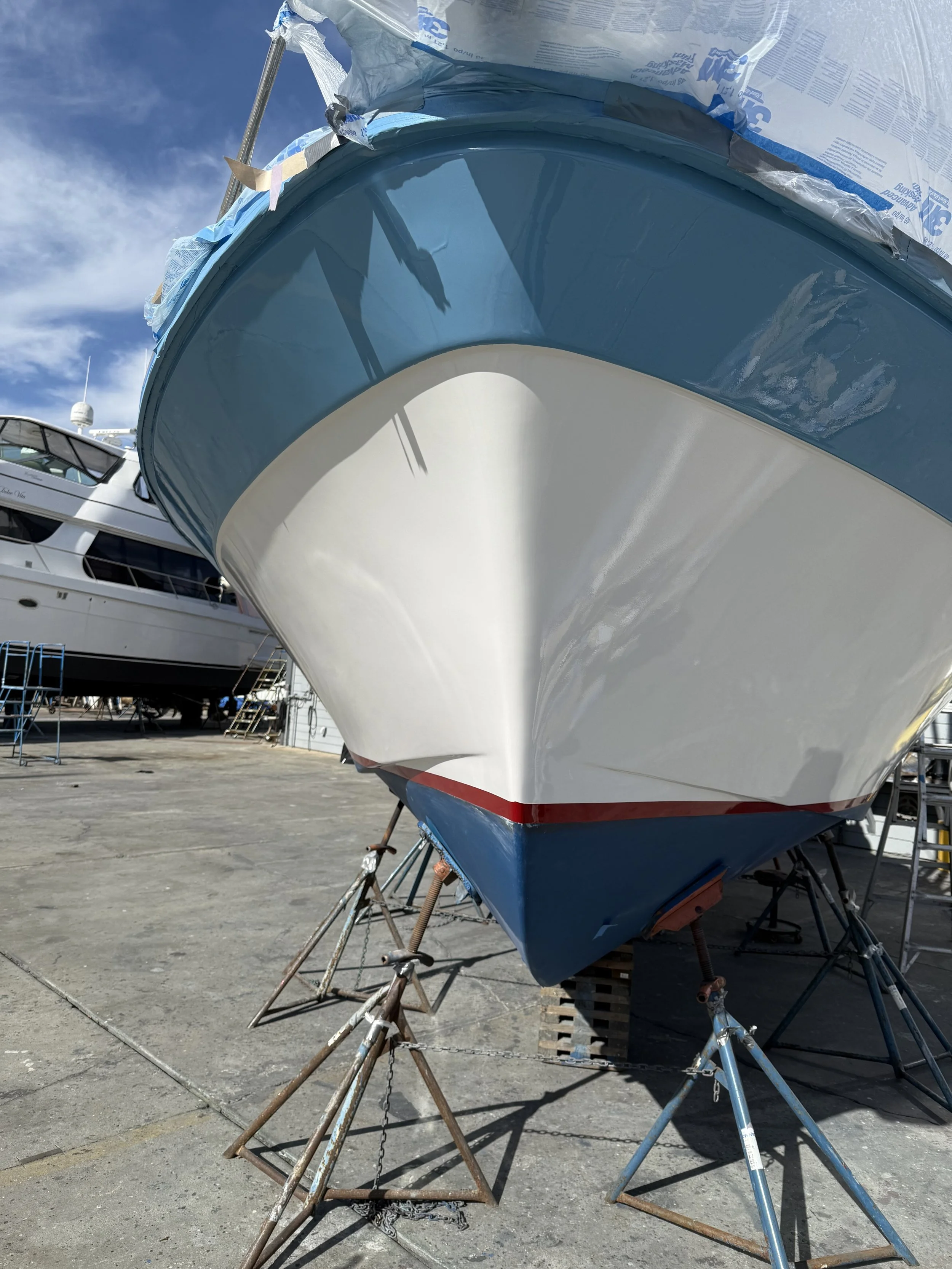 Detail work on motorboat